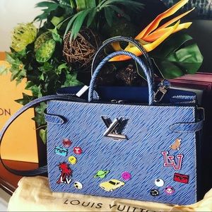 Limited edition Louis Vuitton twist in Epi with 12 stickers attached ,